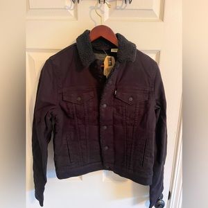 Levi’s black denim truckers jacket. Size small. NWT